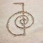 A reiki healing symbol written in sand  picture