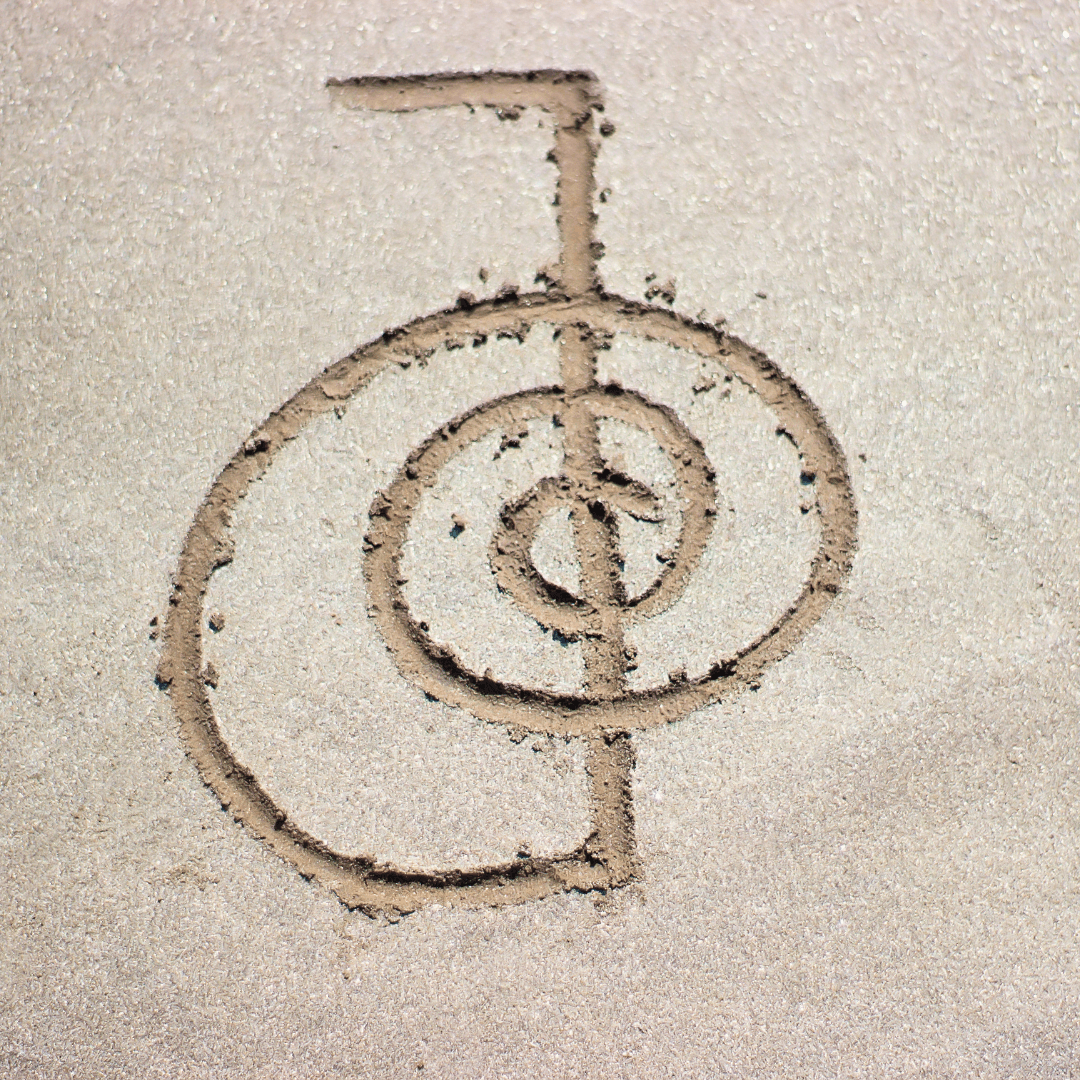 A reiki healing symbol written in sand  picture